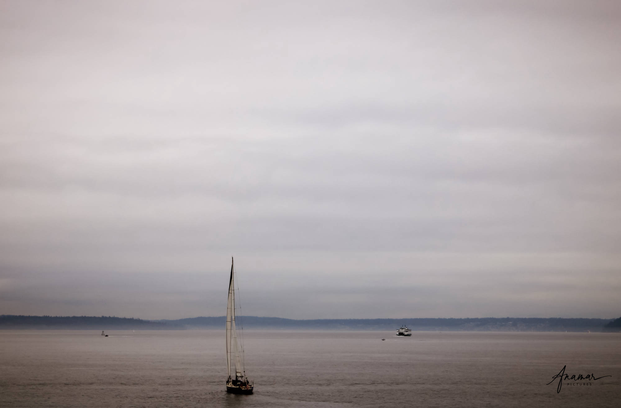 Sailboat in a cloudy day on Elliott Bay | Elliott Bay, Seattle, Washington, USA